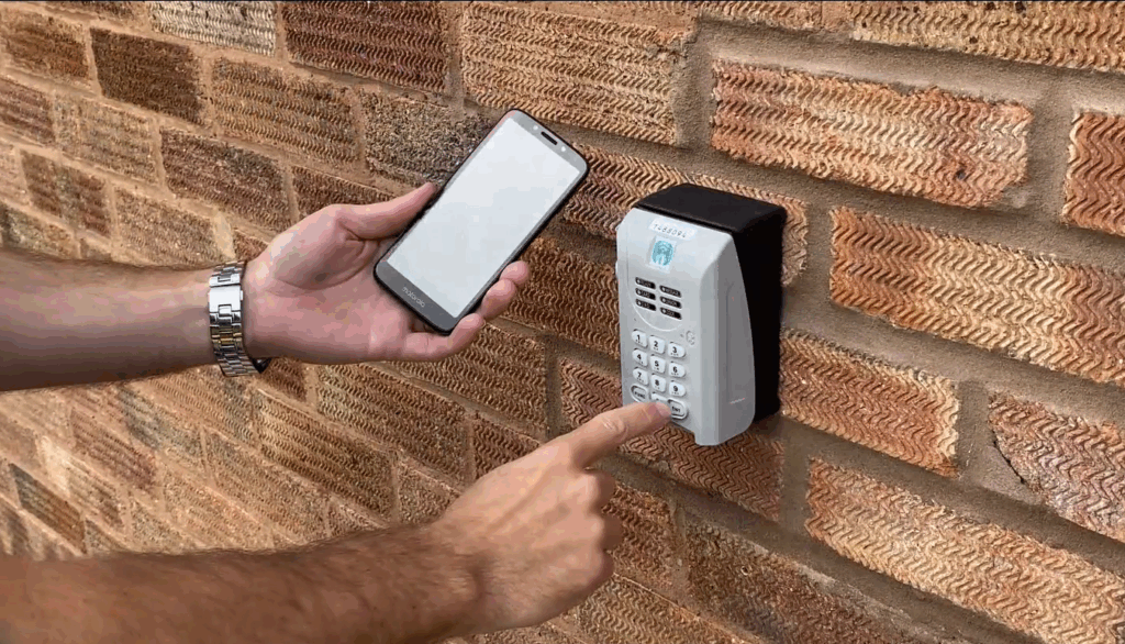 Person using their app to open a secure key lockbox