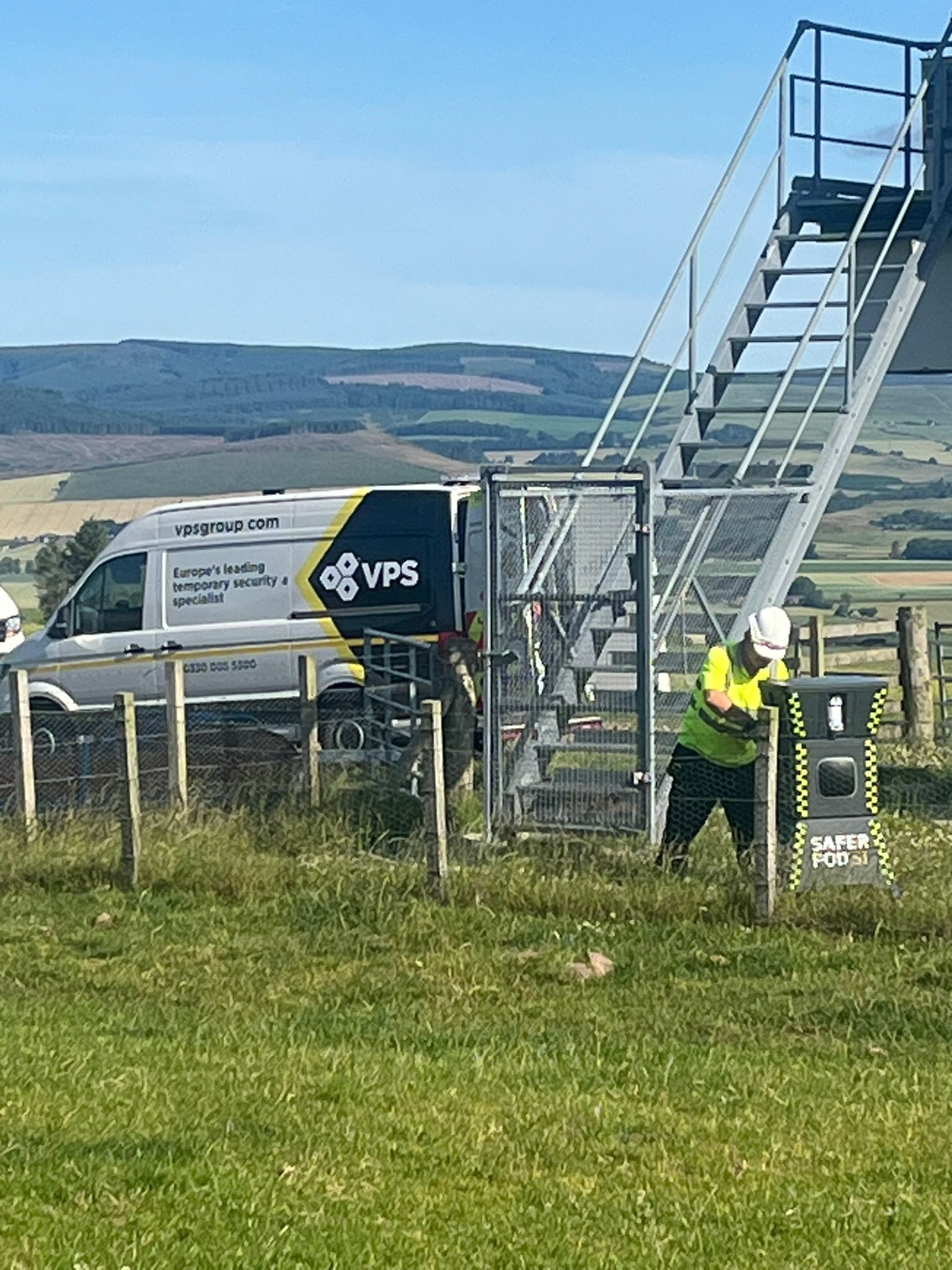 A VPS technician sets up an POD S1 at a windfarm